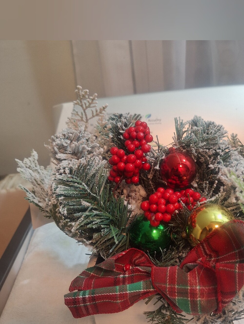 Festive Frosted Pine Centerpiece with Red Plaid Bow and Ornaments